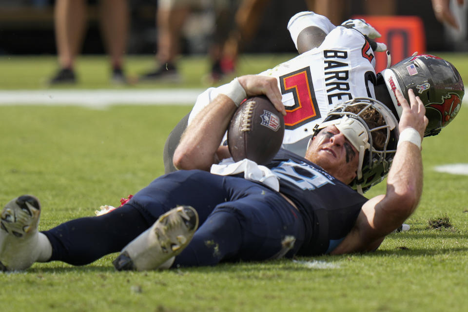 Tennessee Titans quarterback Will Levis (8) lies on the field after being sacked by Tampa Bay Buccaneers linebacker Shaquil Barrett during the first half of an NFL football game Sunday, Nov. 12, 2023, in Tampa, Fla. (AP Photo/Chris O'Meara)