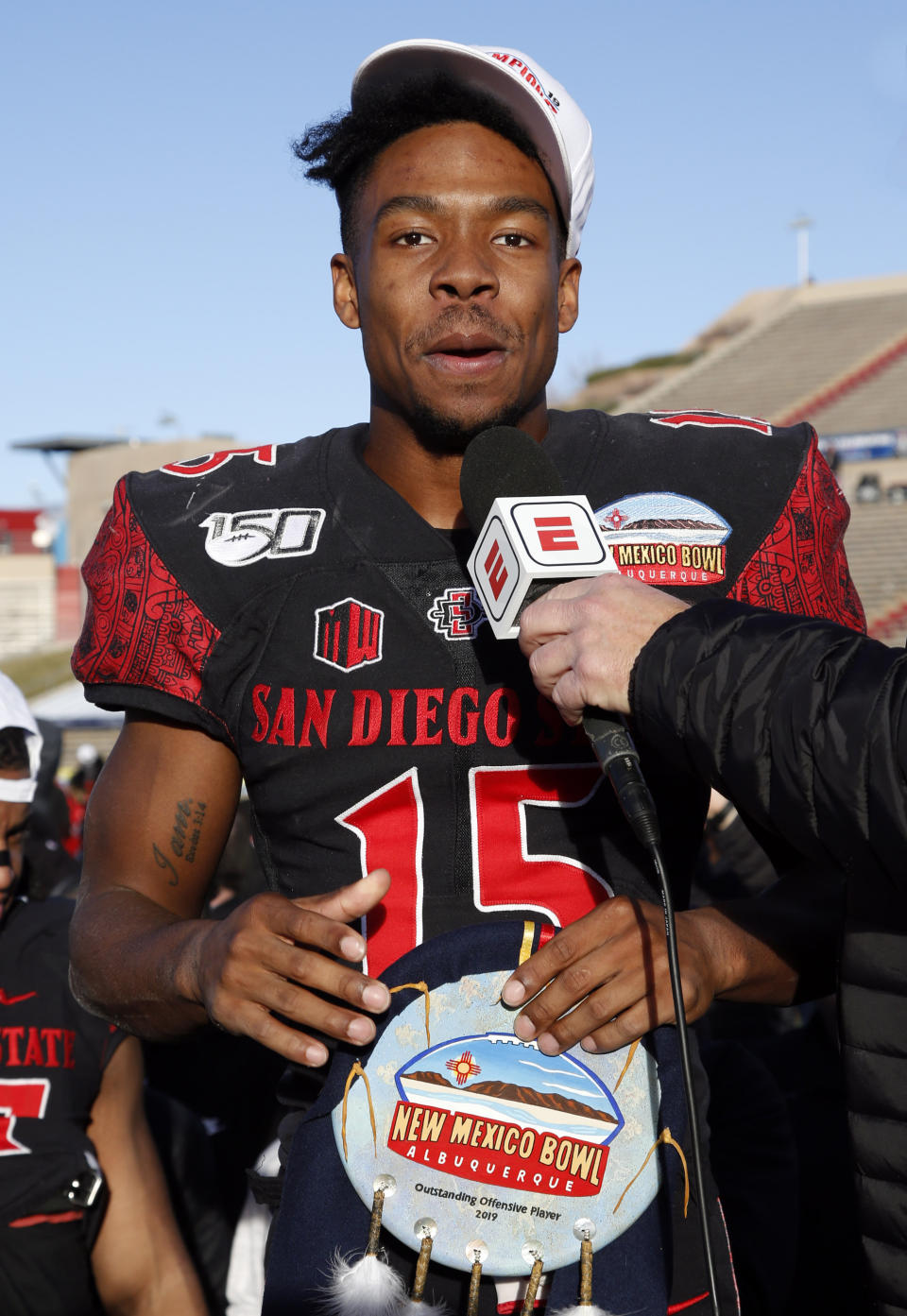San Diego State running back Jordan Byrd, one of the two recipients of the offensive MVP award, speaks during the presentation of the New Mexico Bowl NCAA college football game on Saturday, Dec. 21, 2019 in Albuquerque, N.M. San Diego State beat Central Michigan 48-11. (AP Photo/Andres Leighton)