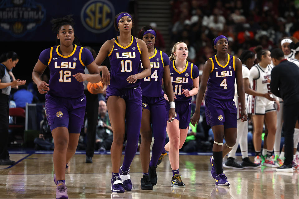 GREENVILLE, SC - MARCH 10: LSU Tigers guard Mikaylah Williams (12), forward Angel Reese (10), guard Aneesah Morrow (24), guard Hailey Van Lith (11), guard Flau'jae Johnson (4) during the SEC Women's Basketball Tournament Championship Game between the LSU Tigers and the South Carolina Gamecocks March 10, 2024 at Bon Secours Wellness Arena in Greenville, S.C. (Photo by John Byrum/Icon Sportswire via Getty Images)