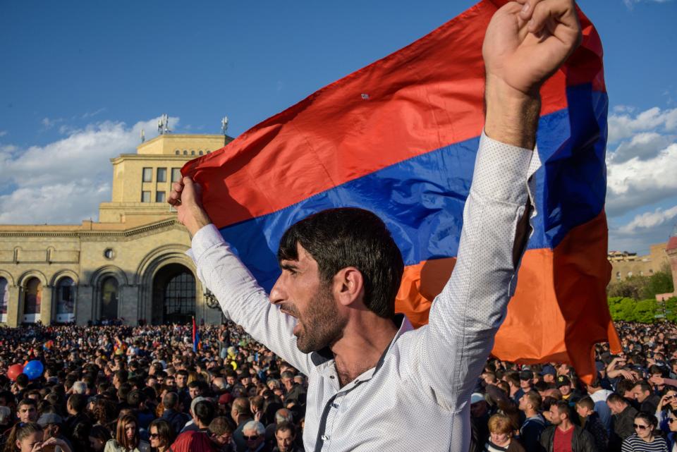 People celebrate Armenian prime minister Serzh Sarkisian's resignation in downtown Yerevan on April 23, 2018.