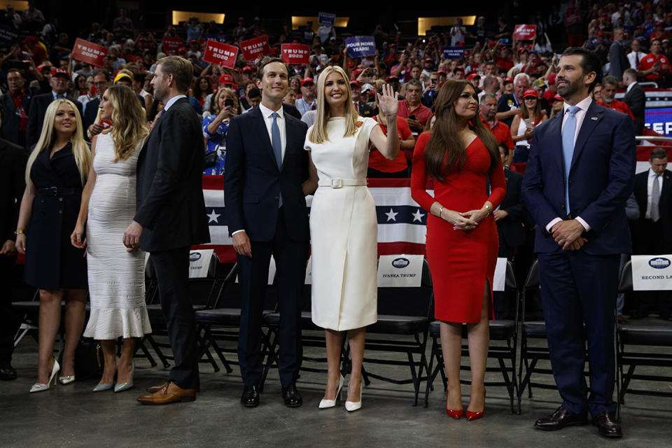 The family of President Donald Trump, from left, Tiffany Trump, Lara Trump, Eric Trump, Jared Kushner, Ivanka Trump, Kimberly Guilfoyle, and Donald Trump Jr., arrive for his re-election kickoff rally at the Amway Center, Tuesday, June 18, 2019, in Orlando. (AP Photo/Evan Vucci)