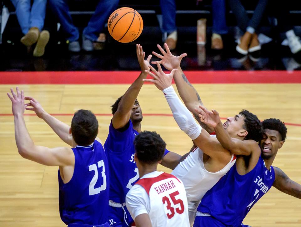 Bradley's Ja'Shon Henry battles a group of Stonehill players for a rebound in the second half Monday, Dec. 19, 2022 at Carver Arena. The Braves decimated the Skyhawks 79-50.