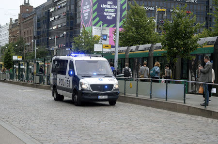 Finnish police patrol the streets, after stabbings in Turku, in Central Helsinki, Finland August 18, 2017. LEHTIKUVA/Linda Manner via REUTERS