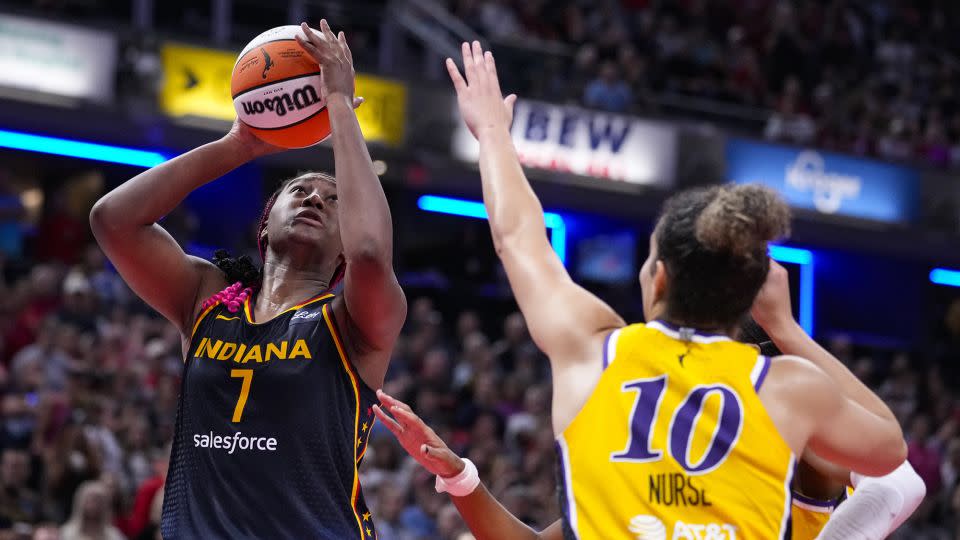 Boston shoots over Sparks guard Kia Nurse. - Michael Conroy/AP