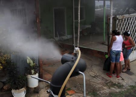 City workers fumigate a street as part of preventive measures against the Zika virus vector, the Aedes aegypti mosquito, in Cucuta, Colombia, January 30, 2016. REUTERS/Manuel Hernandez