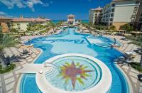 <p><em>Providençiales, Turks & Caicos </em></p>   <p>Beaches Turks & Caicos is that rare family place that respects both children and parents. sits on showcase strand, Grace Bay. It has 19 restaurants and bars, a 45,000-square-foot water park (with surf simulator, lazy river, and tweens-only section spouting water cannons and spray guns), six pools, Xbox 360<sup>®</sup> Game Garage, and bountiful beach activities. Kids interact with Sesame Street characters at breakfasts and piratical parades. Edutainment opportunities abound. The self-contained French Village section almost out-Disneys Disney World. Suites in the newer, plusher Italian Village feature a sliding door that seals off the brood’s bunk-bed room for greater privacy. All rooms now feature a personal Xbox® 360 game console, so parents can sneak off guilt-free for Blue Mountain coffee bean scrubs or romantic dinners.</p>   <p><strong>Insider Tip: </strong>Spend the sunrise on the dock outside Schooners seafood restaurant (owner Butch Stewart’s favorite location on property), and the sunset drinks at the Italian Village pool tower.</p>   <p><strong>Plan Your Trip: </strong>Visit </p>