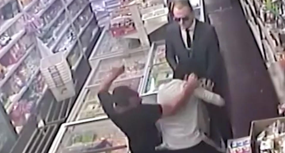 The pair bash the shopkeeper before stealing his necklace. Source: 7 News