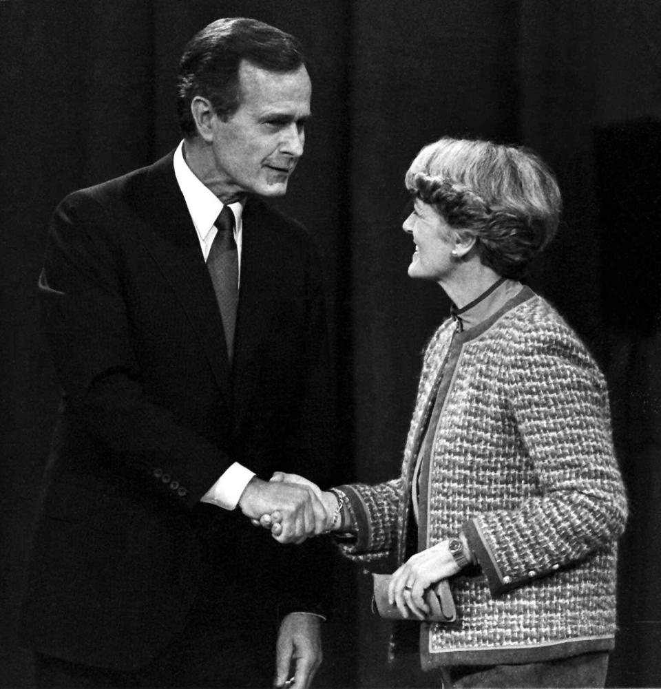 Vice President George Bush shakes hands with Geraldine Ferraro on Oct.11,c1984, at the end of their debate in Philadelphia.