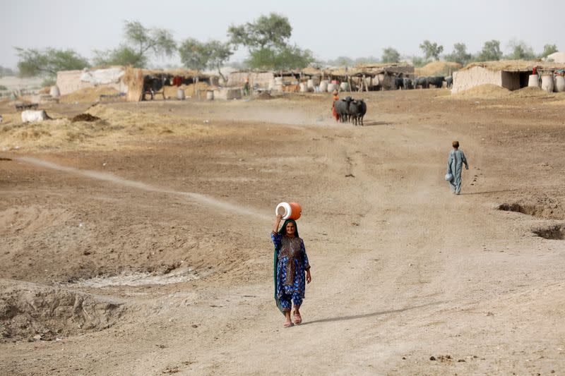 FILE PHOTO: The Wider Image: In hottest city on Earth, mothers bear brunt of climate change