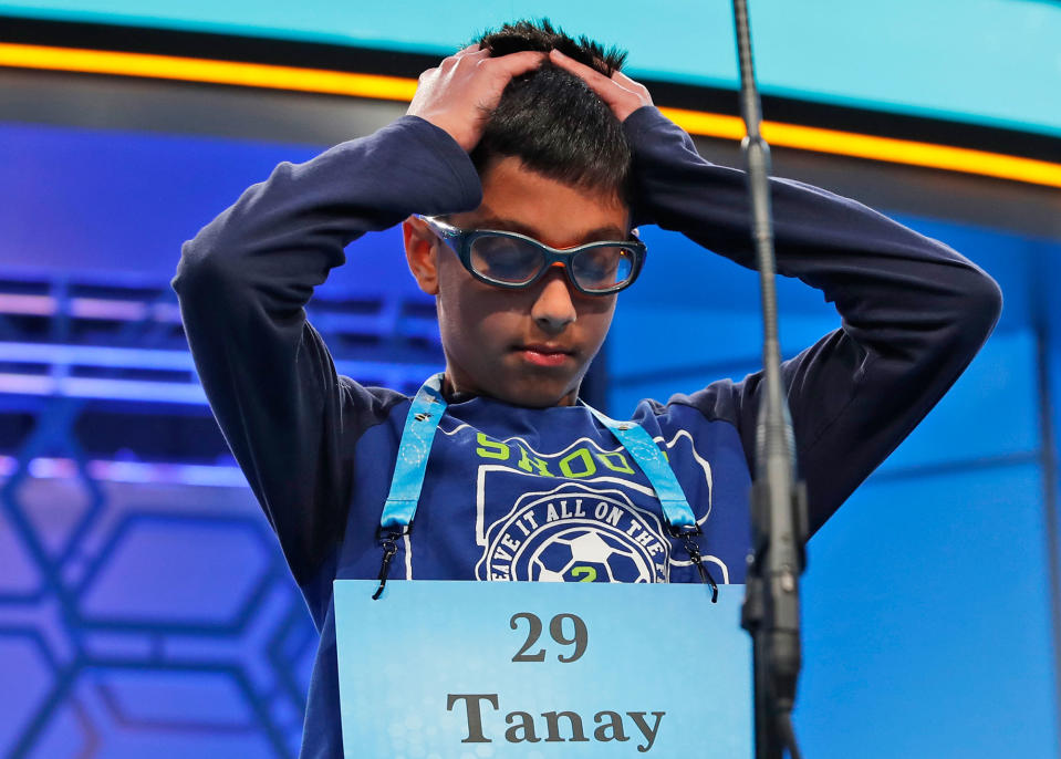 <p>Tanay Nandan, 10, from Short Hills, N.J., thinks about his word in the third round of the 90th Scripps National Spelling Bee, Wednesday, May 31, 2017, in Oxon Hill, Md. Nandan spelled his word correctly. (AP Photo/Alex Brandon) </p>