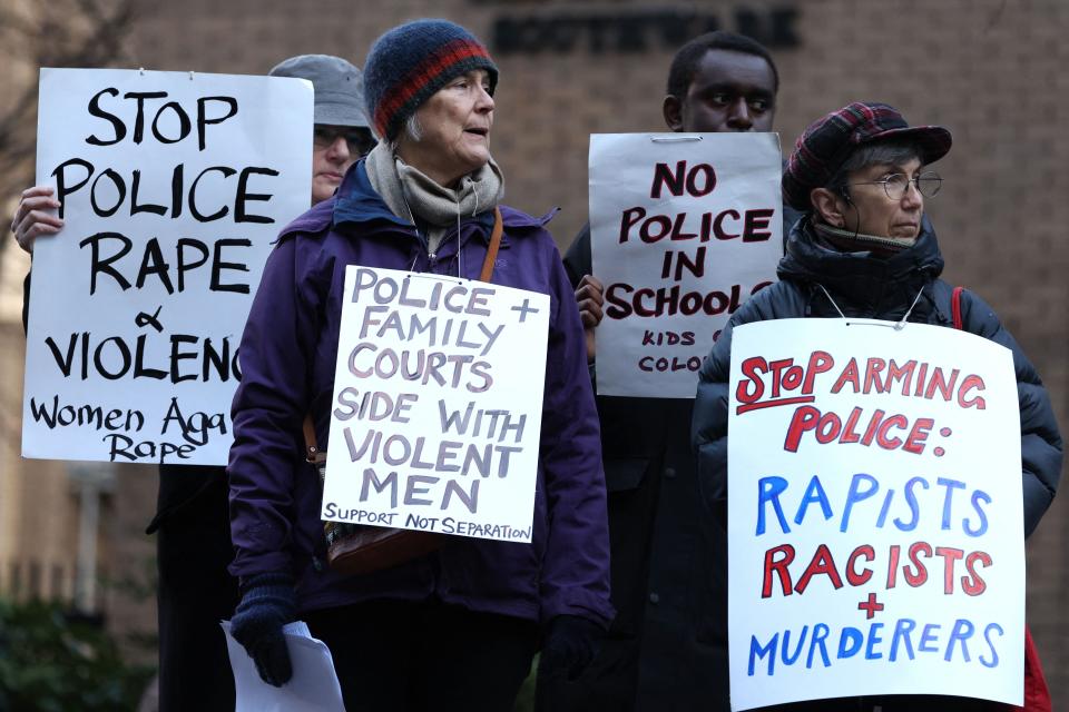 Protesters rally outside of Southwark Crown Court in London on Monday during the two-day sentencing of serial rapist police officer David Carrick.