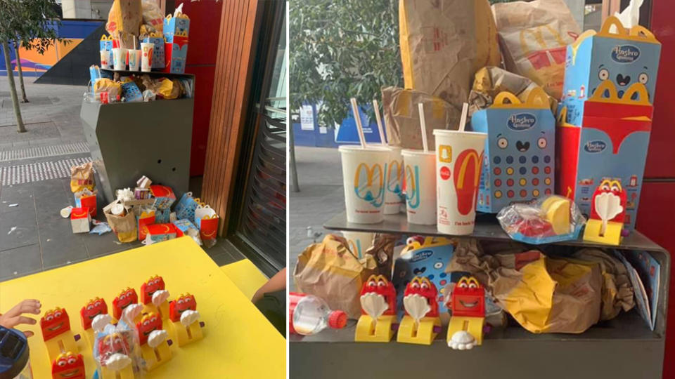McDonald's Happy Meal toys and packaging piled up in rubbish bins in Sydney's Darling Harbour.