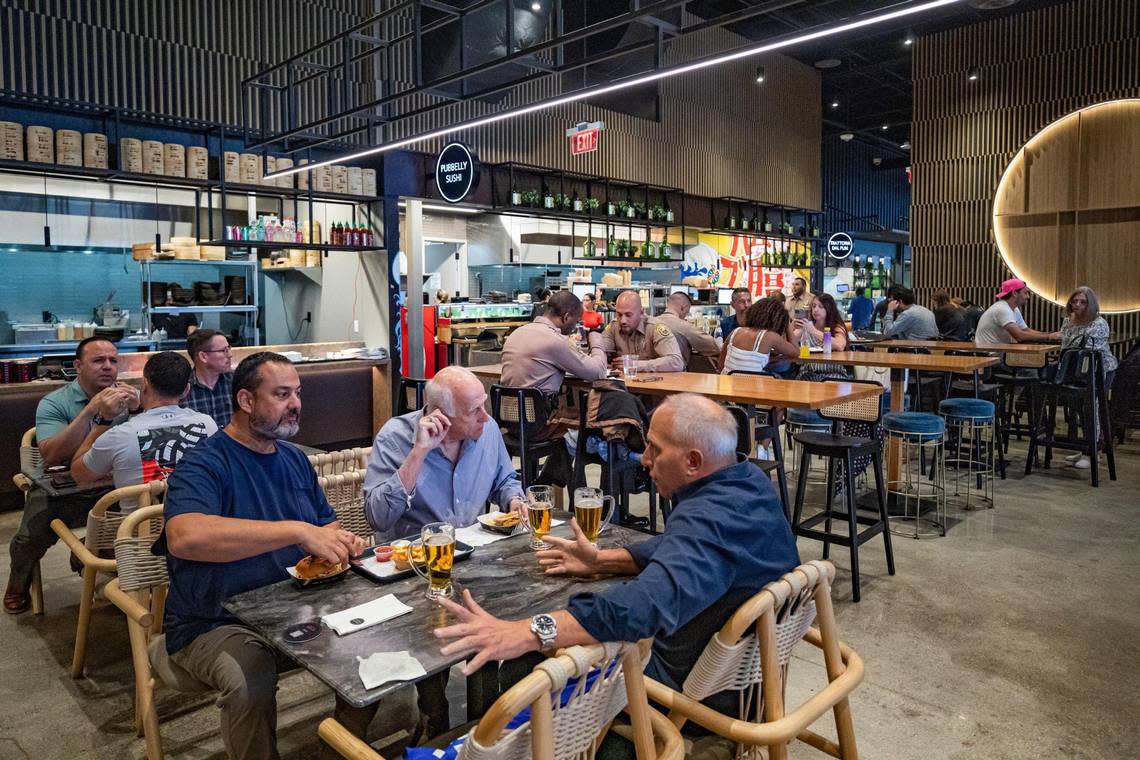 Customers dine at Shoma Bazaar in Doral.