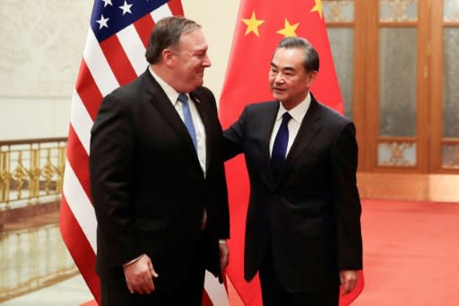 US Secretary of State Mike Pompeo (L) said China has "reaffirmed its commitment" to UN sanctions after talks with Foreign Minister Wang Yi