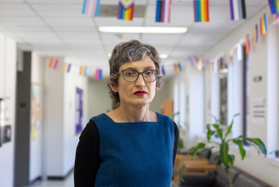 Lecturer Paige Schilt poses for a photo outside of the the Center for Women's & Gender Studies on Feb. 19, 2024. The CWGS room is located inside of Burdine Hall.