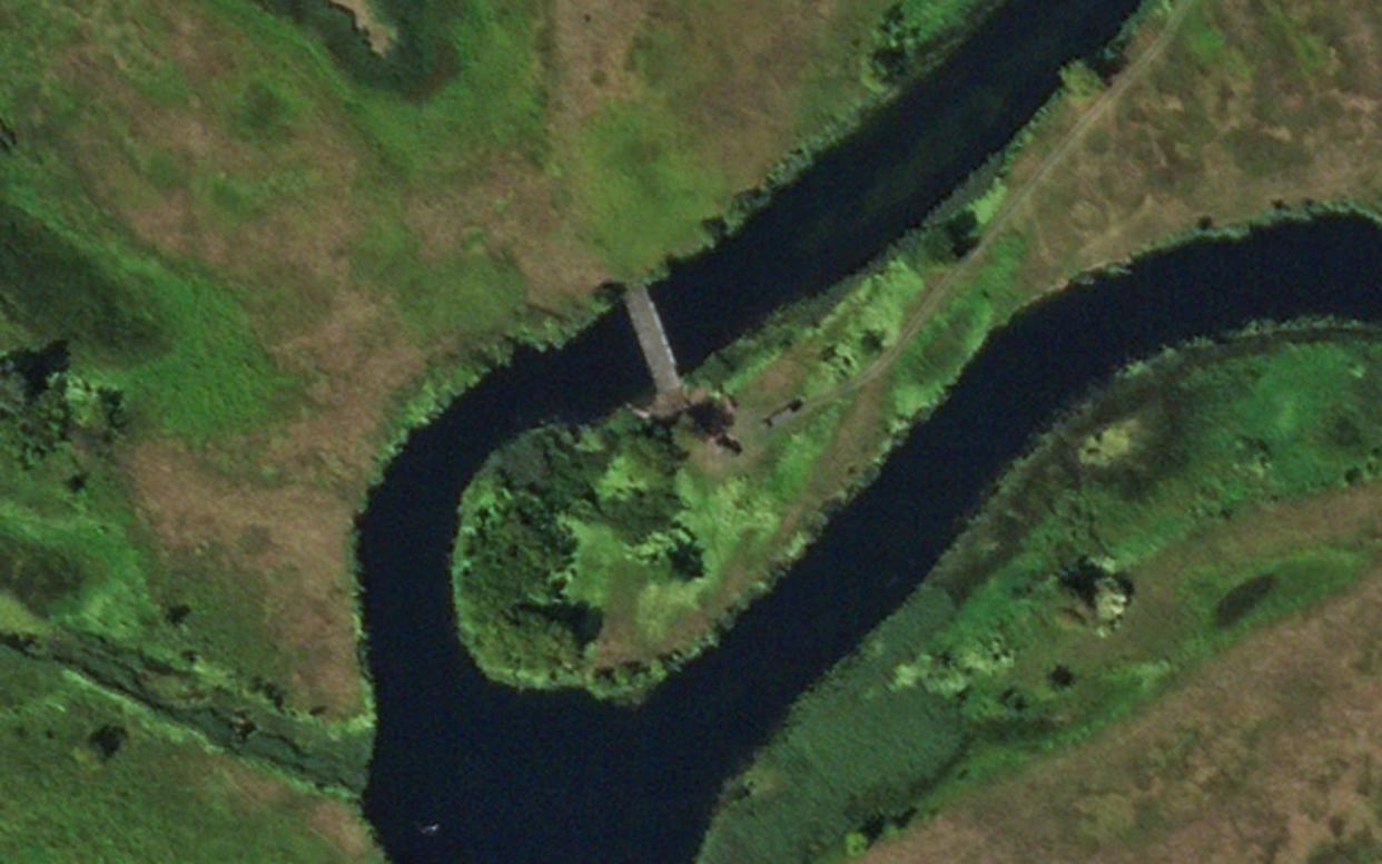 This satellite photo shows a pontoon bridge across the Seim River between the town of Glushkovo