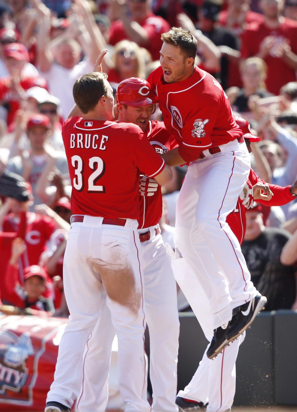 It's been 11 years since the historic 2012 Cincinnati Reds season featuring Jay Bruce (left), Scott Rolen (center), and Chris Heisey (right). Where are the players and managers of the 97-win, National League Central winners now? (Credit: Frank Victores/US PRESSWIRE)