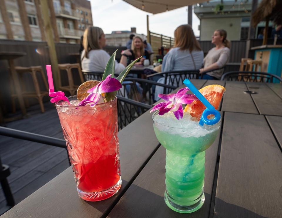 El Diablo, left, and Ocean Eyes cocktails are shown at the PufferFish tiki bar at the Hotel Metro, 411 E. Mason St. in Milwaukee, Wis. The bar recently opened on the hotel’s rooftop following its months-long residency there last year.