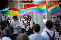People take part in a rally in support of the LGBT community in Lodz