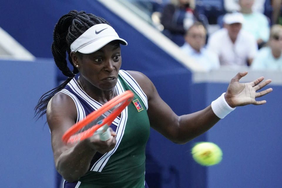 Sloane Stephens, of the United States, returns a shot to Angelique Kerber, of Germany, during the third round of the US Open tennis championships, Friday, Sept. 3, 2021, in New York. (AP Photo/Elise Amendola)