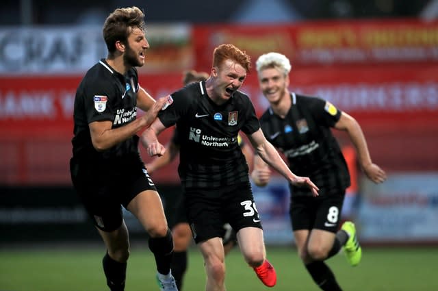 Callum Morton hit a brace as the Cobblers overturned a 2-0 defeat to secure their Wembley place.