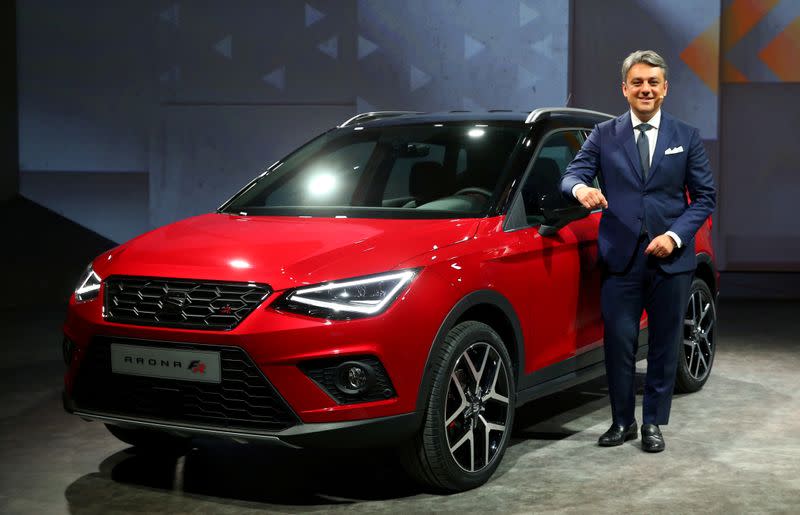 FILE PHOTO: SEAT President and CEO Luca de Meo poses with the new Seat Arona car during a launch event in Barcelona