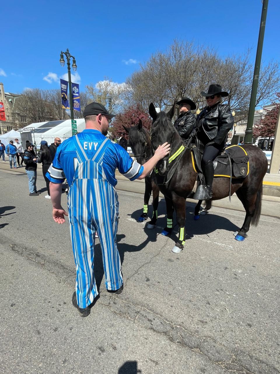 Peter Cornillie flew in to Detroit from Long Island, New York, on April 24, 2024, so he could attend the NFL draft. He is a big Detroit Lions fan having grown up in Grosse Pointe. On April. 25, 2024, Cornillie stopped to pet Wayne County Sheriff's Office horse, Hogan, whose glittery hooves in Lions colors caught his eye.