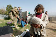 <p>A displaced Iraqi, who fled her home, looks for a safe area in Mosul, Iraq Feb. 28, 2017. (Alaa Al-Marjani/Reuters) </p>