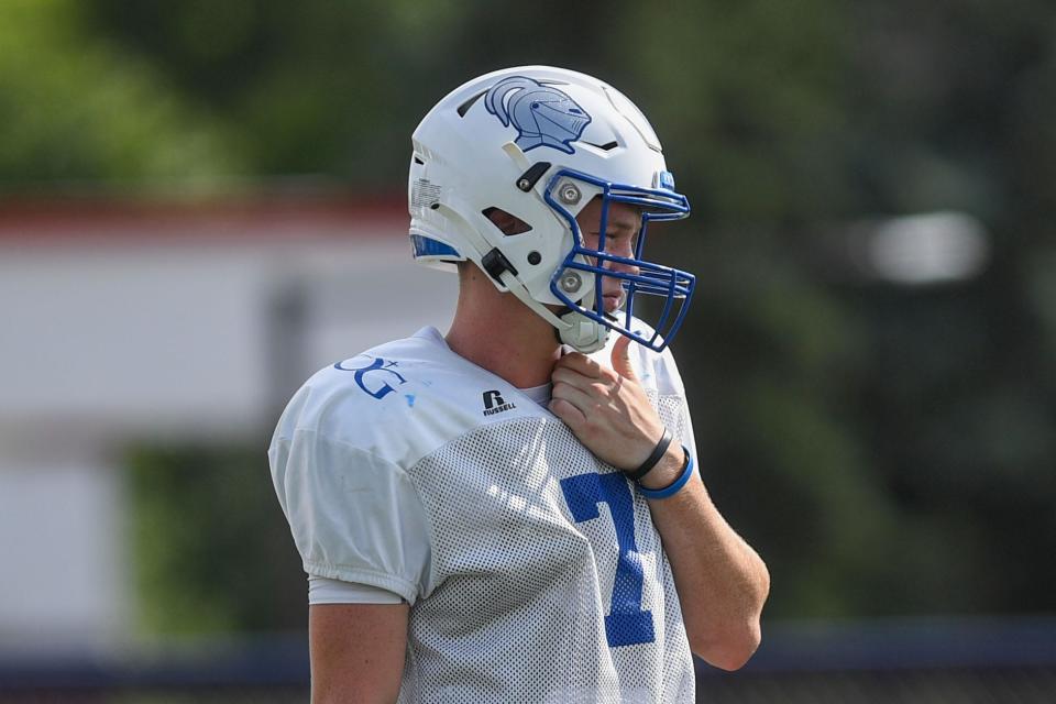 Hayden Groos (7) listens to the coach at O'Gorman High School in Sioux Falls, South Dakota on Wednesday, August 16, 2023.