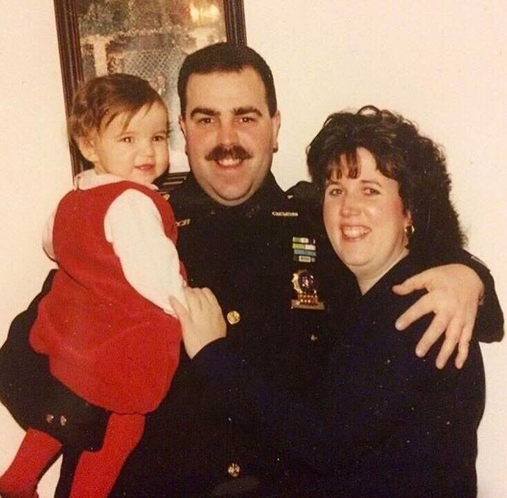 Emily Thomas with her dad and mom. This photo was taken after her father became a NYPD detective in 1998. (Photo: Courtesy of Emily Thomas)