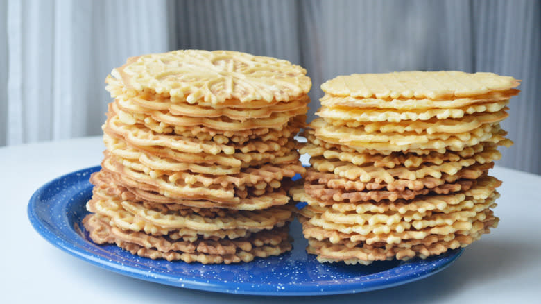 Two stacks of pizzelle on a plate