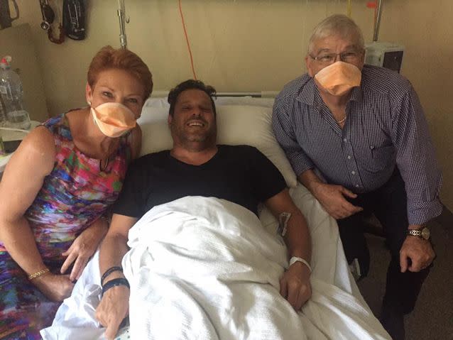 Pauline Hanson (left) catches a bad case of irony after the new One Nation senator Peter Georgiou (centre) catches the measles. Party whip Brian Burston (right) also pictured. Source: Facebook/Pauline Hanson Please Explain