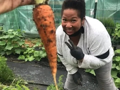 LeTicia Marshall grows fruits and vegetables in her community garden