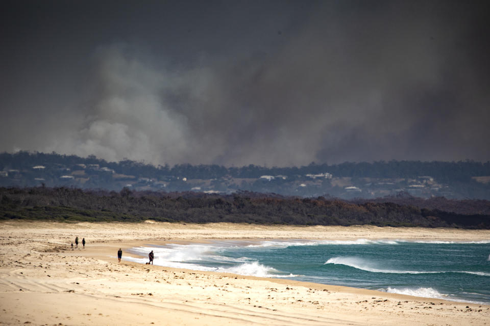 Skies turning to charcoal as bushfires rage