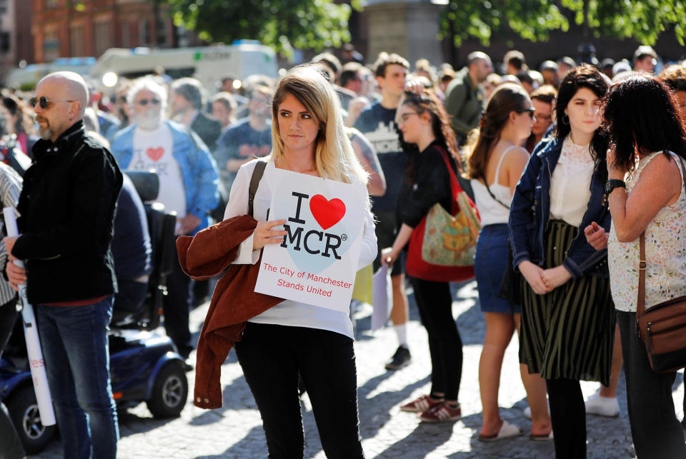 <p>A woman waits to take part in a vigil for the victims of an attack on concert goers at Manchester Arena, in central Manchester, Britain on May 23, 2017. (Darren Staples/Reuters) </p>