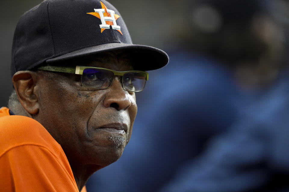 Houston Astros manager Dusty Baker Jr. watches during the fourth inning in Game 2 of baseball's American League Championship Series against the Boston Red Sox Saturday, Oct. 16, 2021, in Houston. (AP Photo/David J. Phillip)
