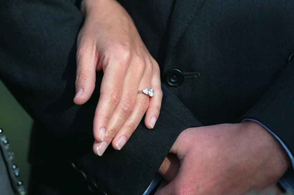 <p>Prince Edward opted for a traditional diamond ring featuring a 2-carat oval diamond set in white gold, with slightly smaller heart-shaped diamonds on both sides. The royal wears the sparkler with her traditional Welsh gold wedding band. </p>