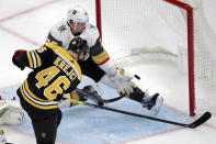Boston Bruins center David Krejci (46) beats Vegas Golden Knights defenseman Nick Holden (22) for a goal during the third period of an NHL hockey game in Boston, Tuesday, Jan. 21, 2020. (AP Photo/Charles Krupa)