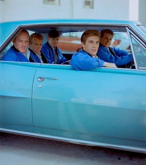 The Beach Boys go for a cruise in a rare photo from "The Beach Boys" book, the only official compilation from the band.
