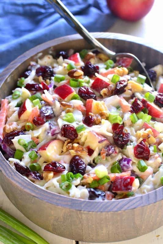 <p>Lemon Tree Dwelling</p><p>Apple cranberry coleslaw is the perfect way to mix things up for fall! Loaded with fresh apples, dried cranberries, chopped walnuts and green onions, this coleslaw is crunchy, sweet and so delicious!</p><p><strong>Get the recipe: <a href="https://www.lemontreedwelling.com/apple-cranberry-coleslaw/" rel="nofollow noopener" target="_blank" data-ylk="slk:Apple Cranberry Coleslaw;elm:context_link;itc:0;sec:content-canvas" class="link ">Apple Cranberry Coleslaw</a></strong></p>