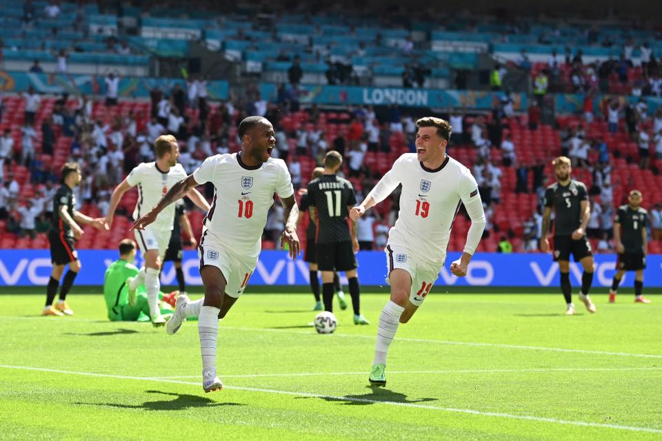 Raheem Sterling celebrates scoring England’s winning goal (AP)