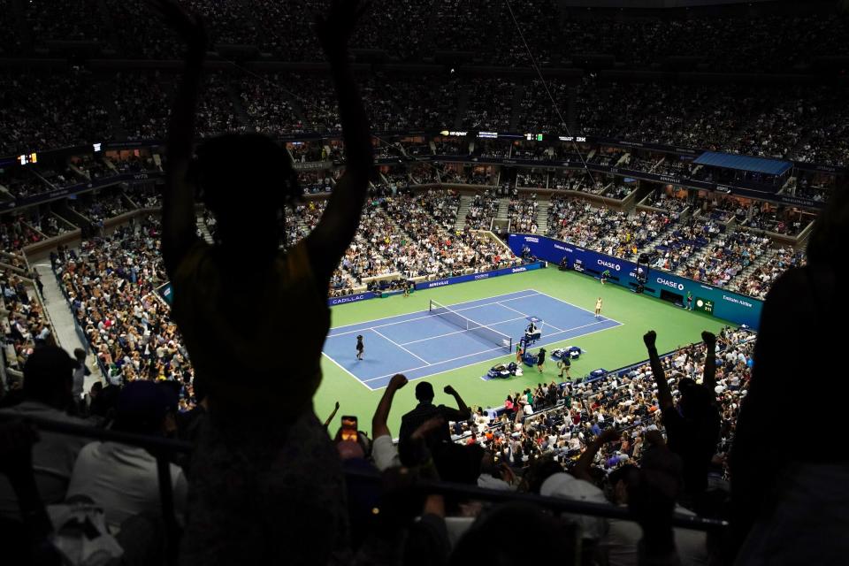Fans at Arthur Ashe Stadium rise to their feet upon watching Serena Williams beat Anett Kontaveit.
