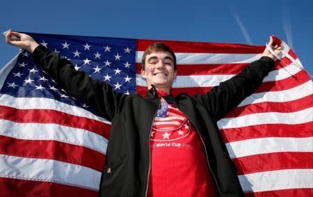 USA fan poses outside the stadium before the match. Action Images via Reuters / Peter Cziborra Livepic