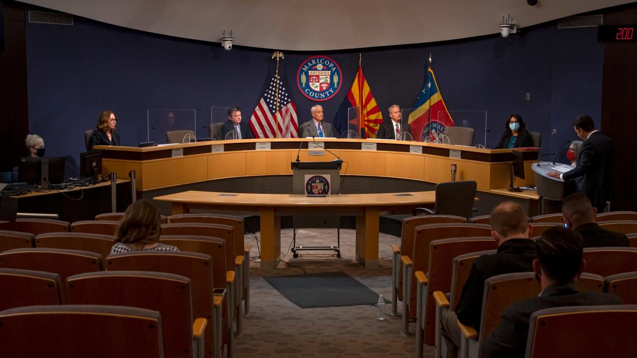 Members of the Maricopa County Board of Supervisors listen as the newest supervisor, Thomas Galvin, speaks after he is sworn in at the Board of Supervisors Auditorium in Phoenix on Dec. 8, 2021.