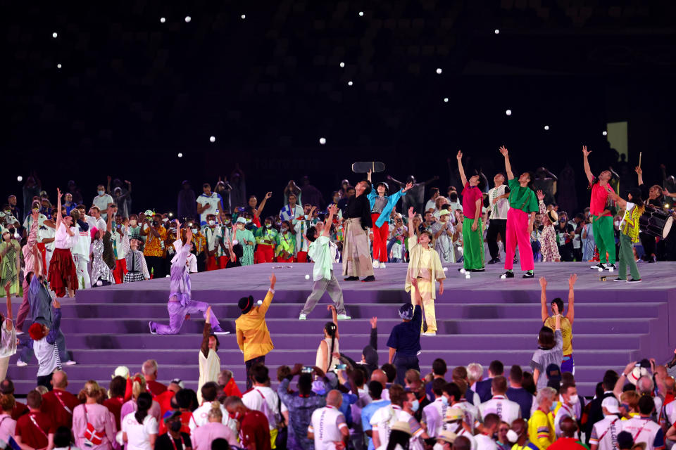 <p>Dancers perform as athletes gather during the Tokyo 2020 Olympic Games closing ceremony on day sixteen at Olympic Stadium on August 08, 2021 in Tokyo, Japan. (Photo by Abbie Parr/Getty Images)</p> 