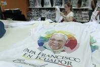 A shirt portraying Pope Francis is seen in a shop in Quito on July 3, 2015