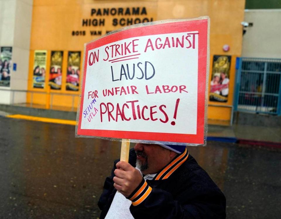 Mar 21, 2023; Los Angeles, Calif., USA; A 3 day strike by employees of the Los Angeles Unified School District began at 4:30 AM at the Van Nuys Bus Yard. More than 60,000 bus drivers, custodians, cafeteria employees, campus security, teaching assistants and educators from the Los Angeles Unified School District are striking from March 21 to 23. They demand a 30% raise and a $2 per hour equity wage increase. Mandatory Credit: Robert Hanashiro-USA TODAY