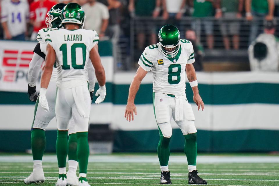 New York Jets quarterback Aaron Rodgers (8) limps after a sack during the first half of an NFL football game against the Buffalo Bills on Monday, Sep. 11, 2023, in East Rutherford, N.J.