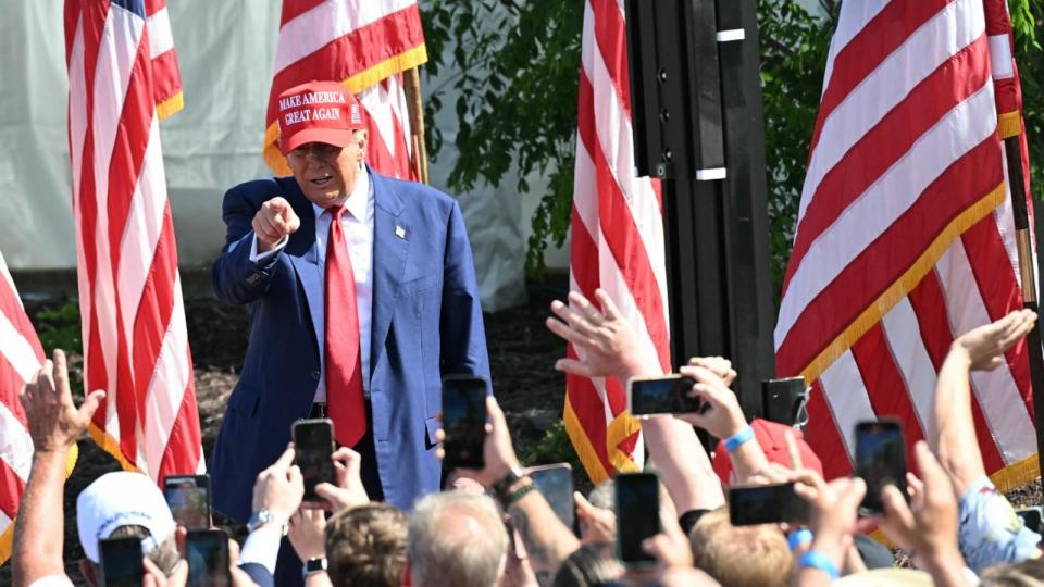 PHOTO: Donald Trump arrives to speak at a campaign event in Racine, Wisconsin, on June 18, 2024. (Jim Watson/AFP via Getty Images)