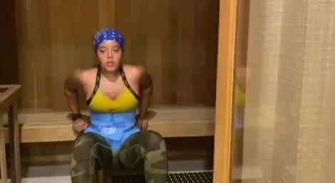 Angela Simmons works out in a sauna